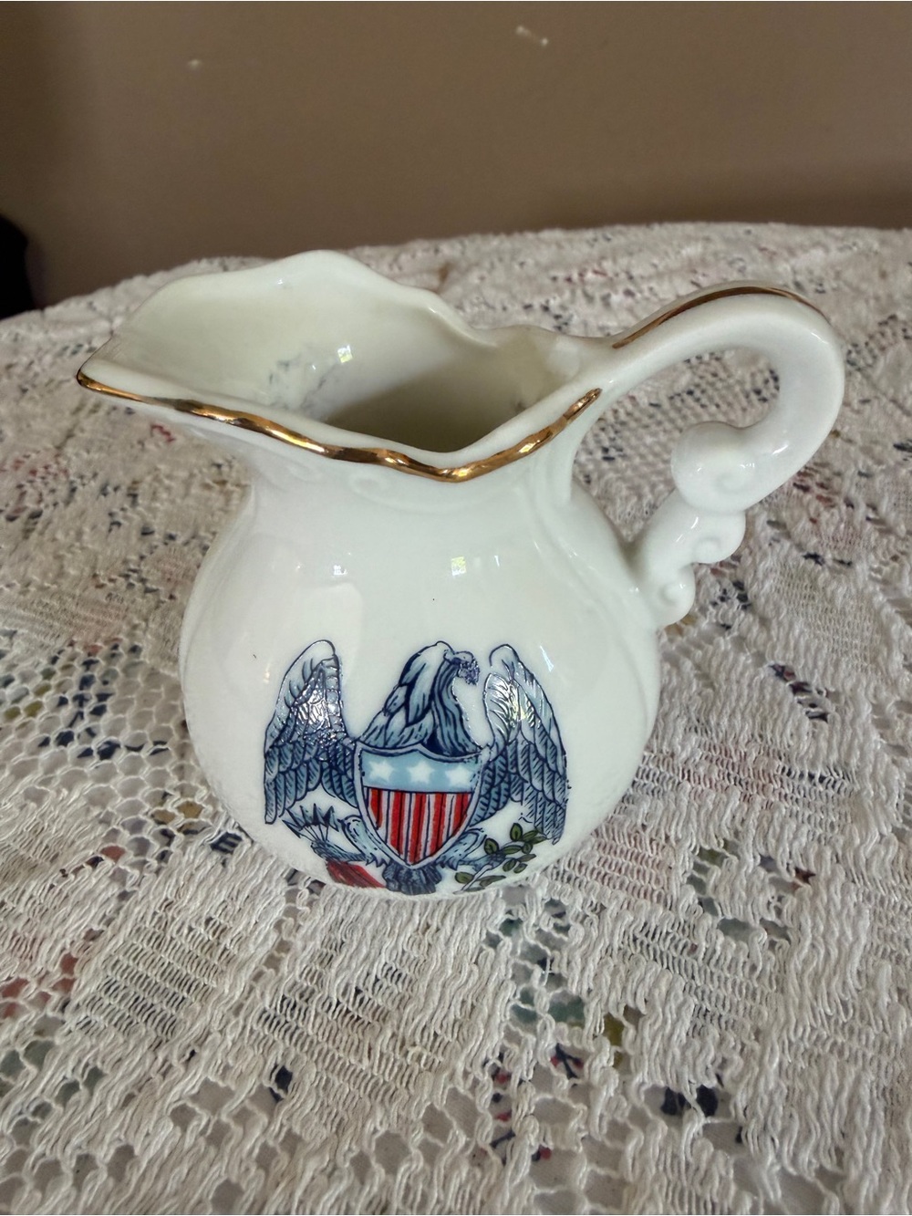 White Porcelain Pitcher with Eagle Crest and Gold Trim